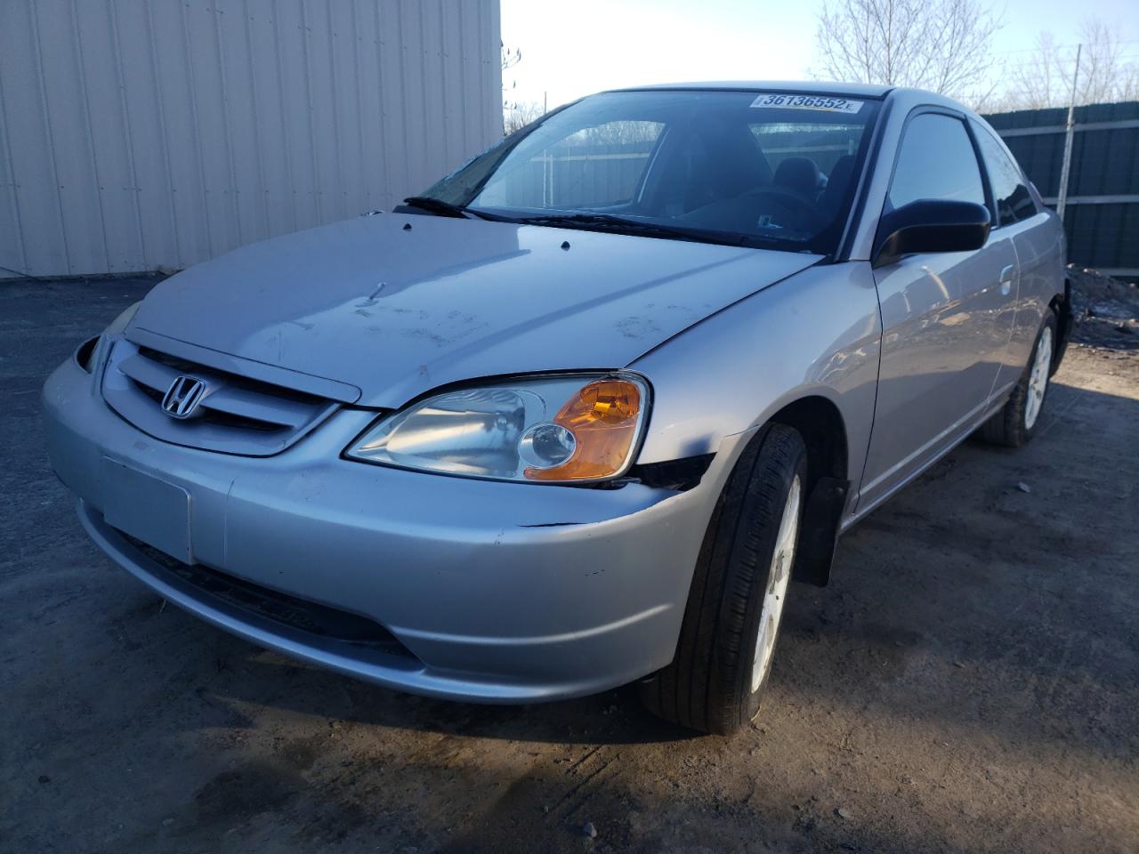 Photo 2 from auction – 2003 HONDA CIVIC LX with VIN 1HGEM225X3L001790