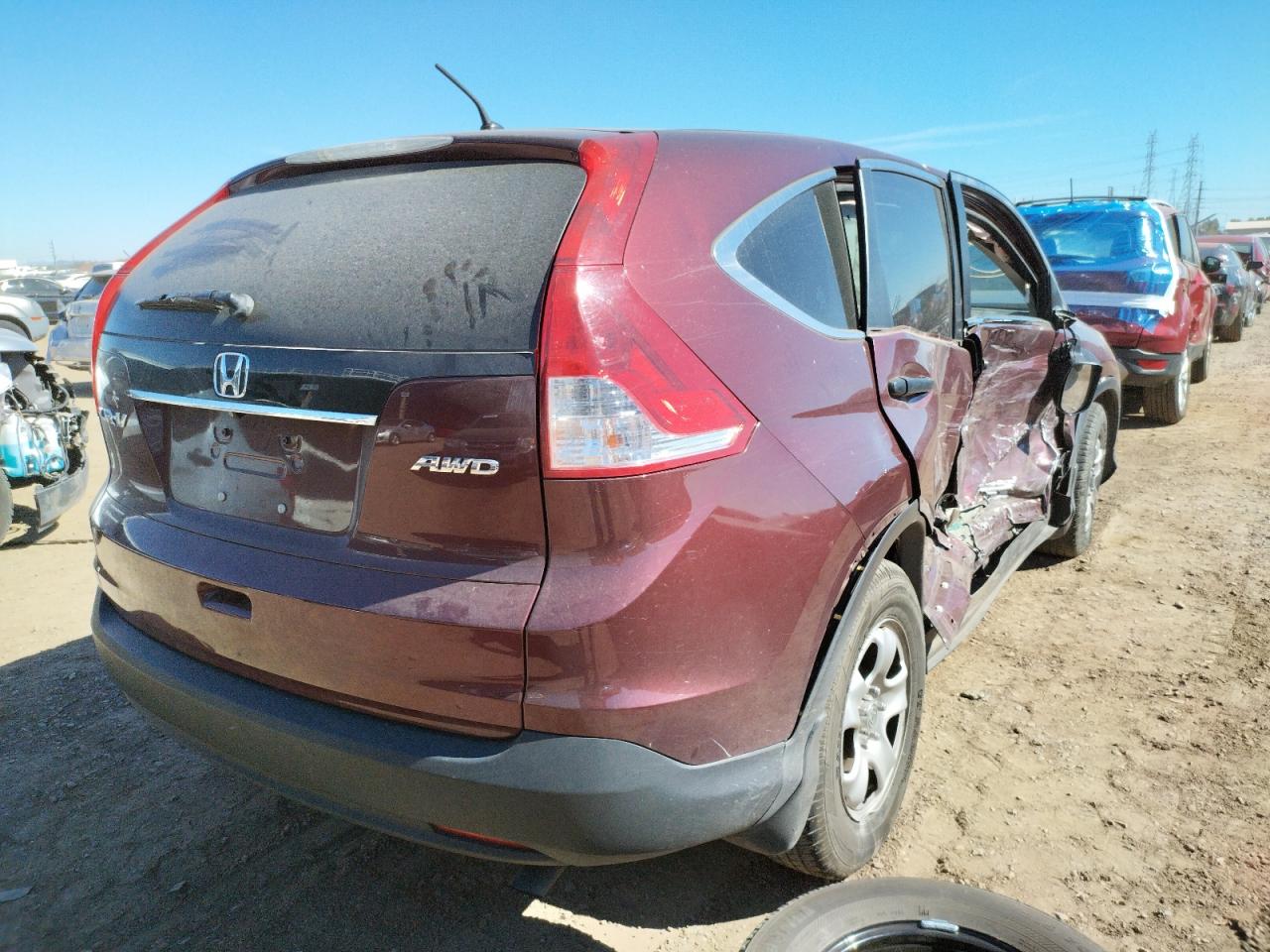 Photo 4 from auction – 2014 HONDA CR-V LX with VIN 5J6RM4H32EL045071