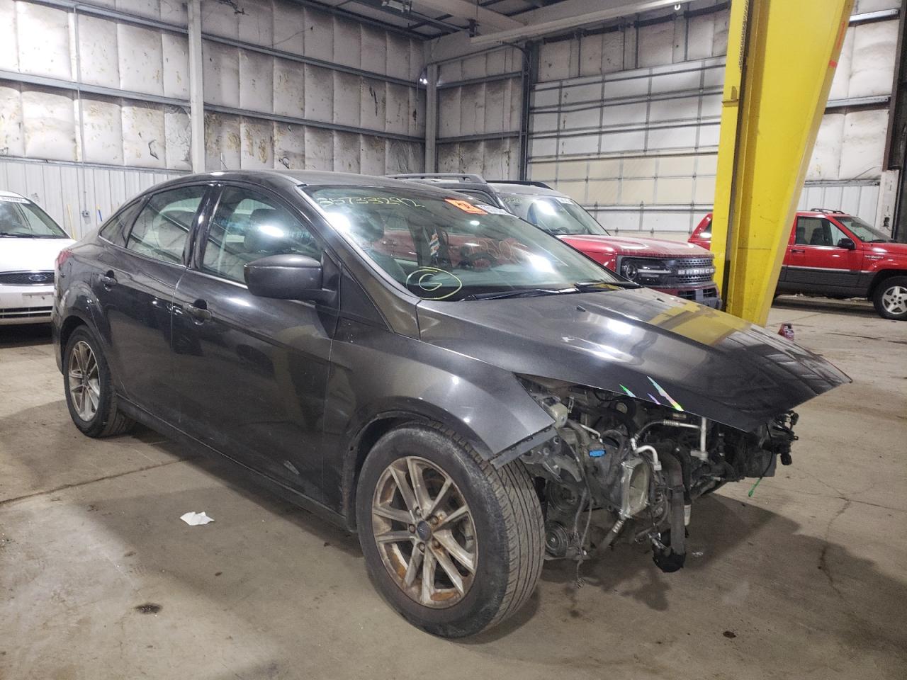FORD FOCUS SE 2018 with VIN 1FADP3F22JL252569 - Photo from auction