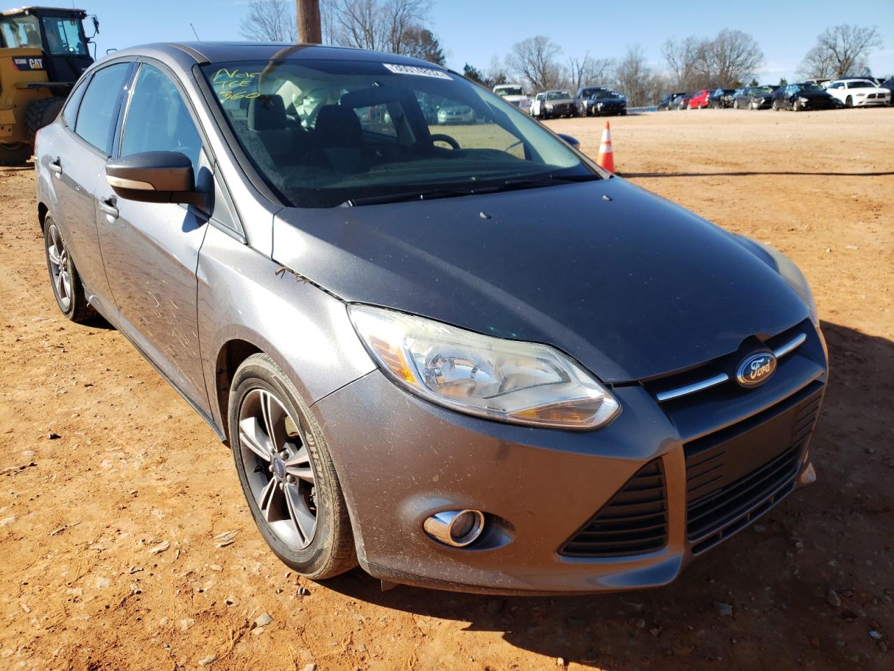FORD FOCUS SE 2014 with VIN 1FADP3F20EL436530 - Photo from auction