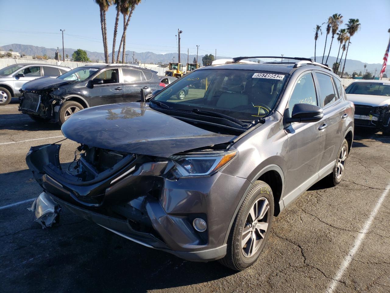 Photo 2 from auction – 2016 TOYOTA RAV4 XLE with VIN JTMWFREV2GJ074168