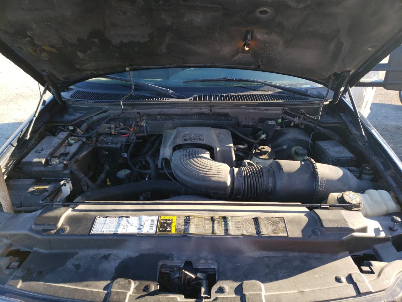 Photo 7 from auction – 2002 FORD F150 with VIN 1FTRX18L42NB00695
