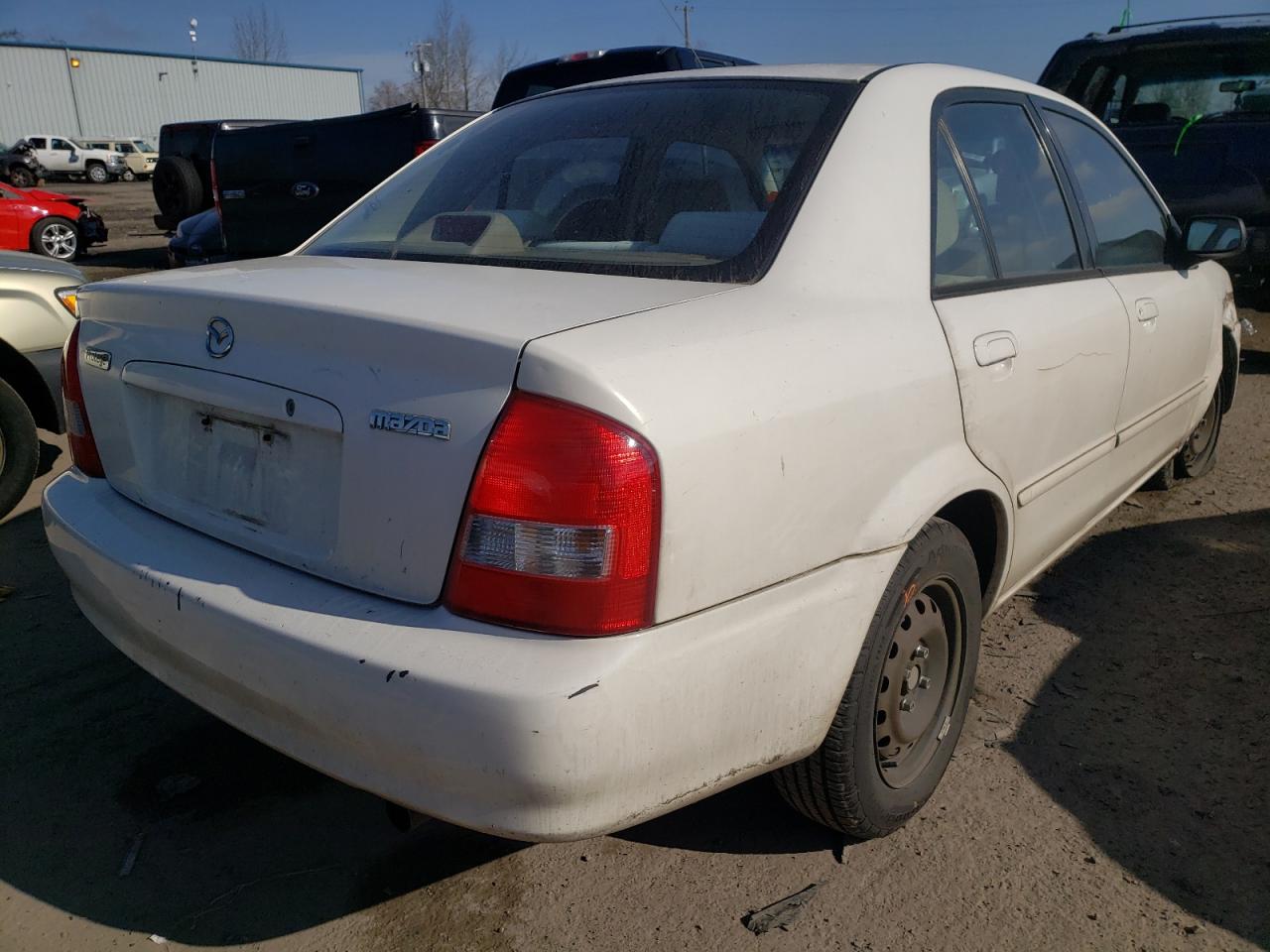 Photo 4 from auction – 1999 MAZDA PROTEGE DX with VIN JM1BJ2228X0116976