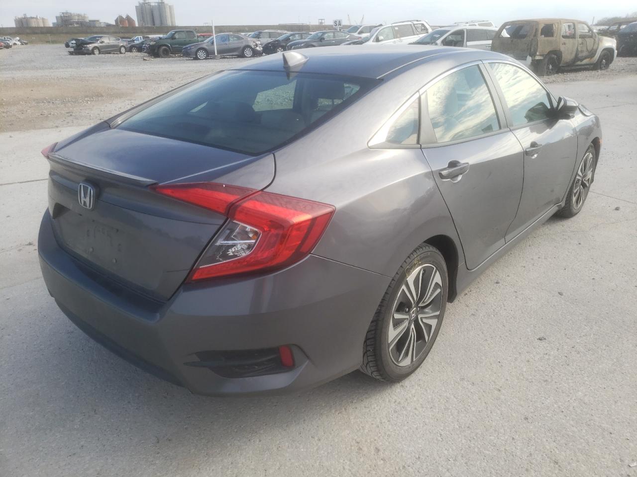 Photo 4 from auction – 2018 HONDA CIVIC EX with VIN JHMFC1F37JX042777