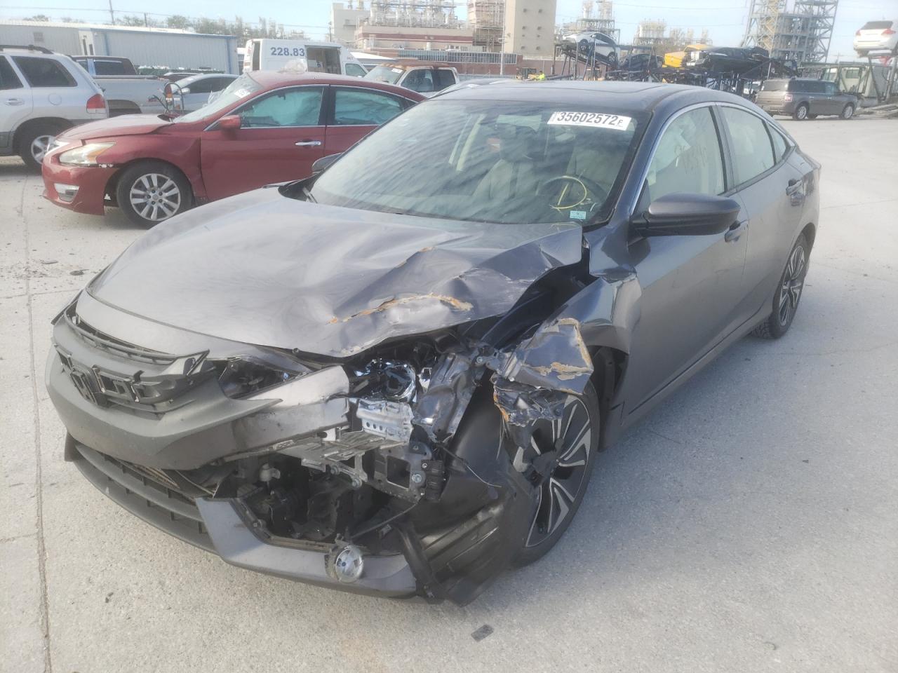 Photo 2 from auction – 2018 HONDA CIVIC EX with VIN JHMFC1F37JX042777