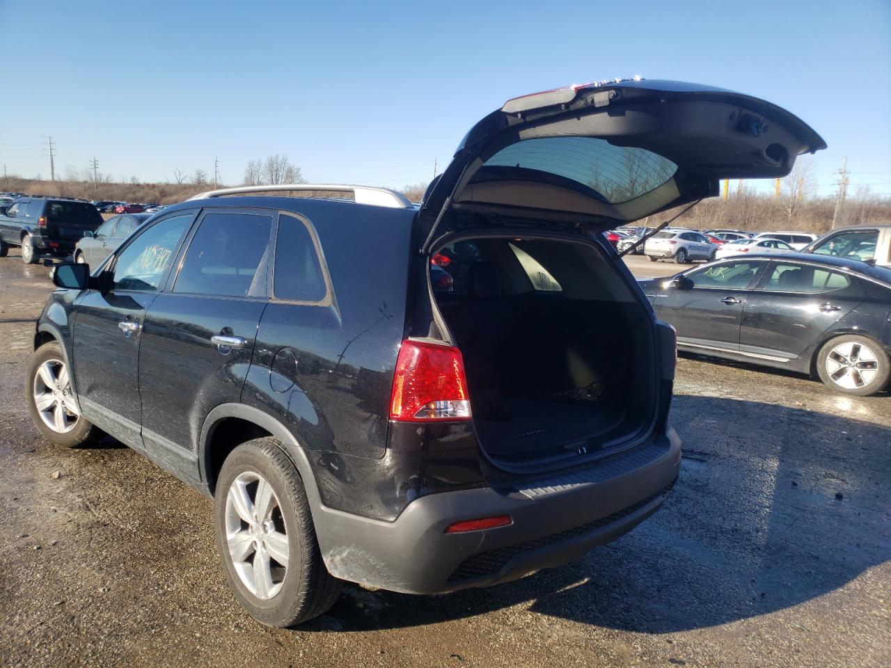 Photo 3 from auction – 2012 KIA SORENTO EX with VIN 5XYKU3A61CG299689