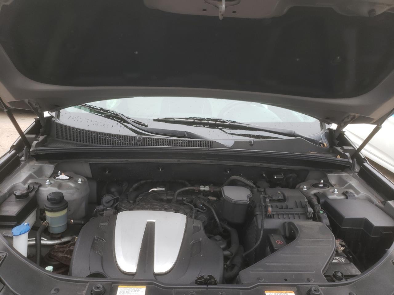 Photo 7 from auction – 2012 KIA SORENTO SX with VIN 5XYKWDA27CG229482