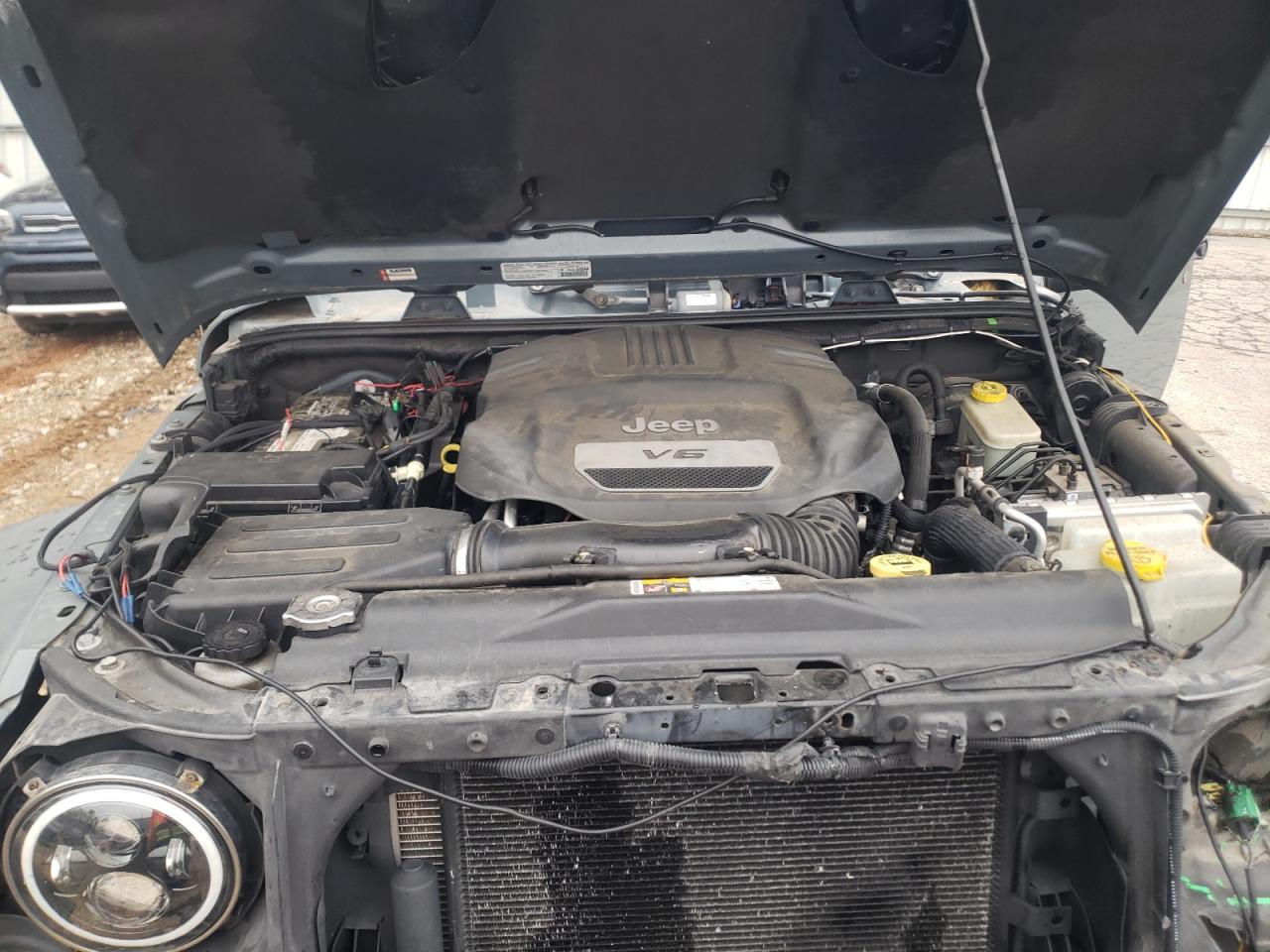Photo 7 from auction – 2014 JEEP WRANGLER U with VIN 1C4HJWFG6EL119149