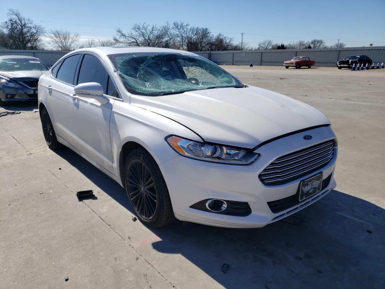 FORD FUSION SE 2016 with VIN 3FA6P0H96GR381992 - Photo from auction