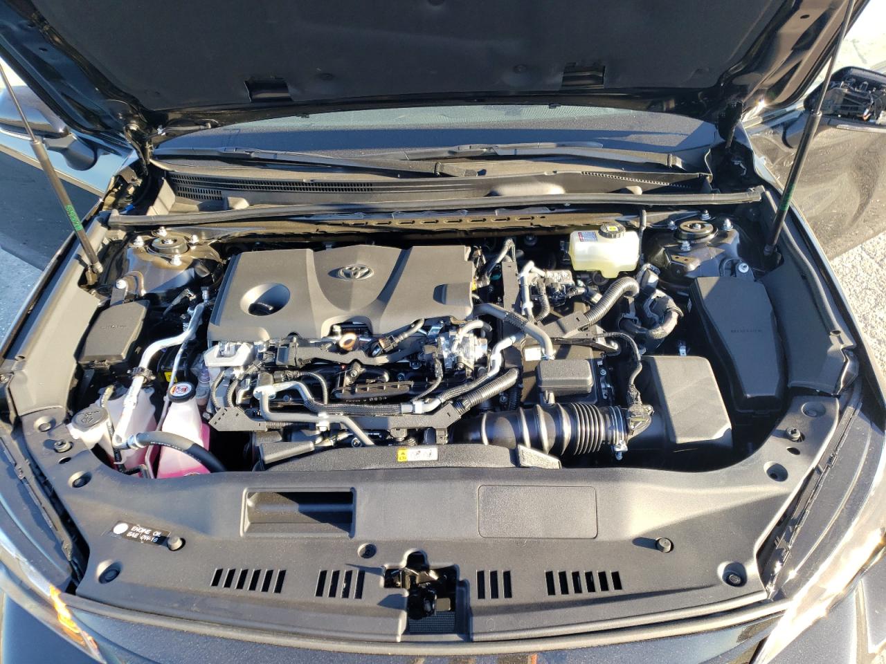 Photo 7 from auction – 2022 TOYOTA AVALON NIG with VIN 4T1EA1AB9NU012877