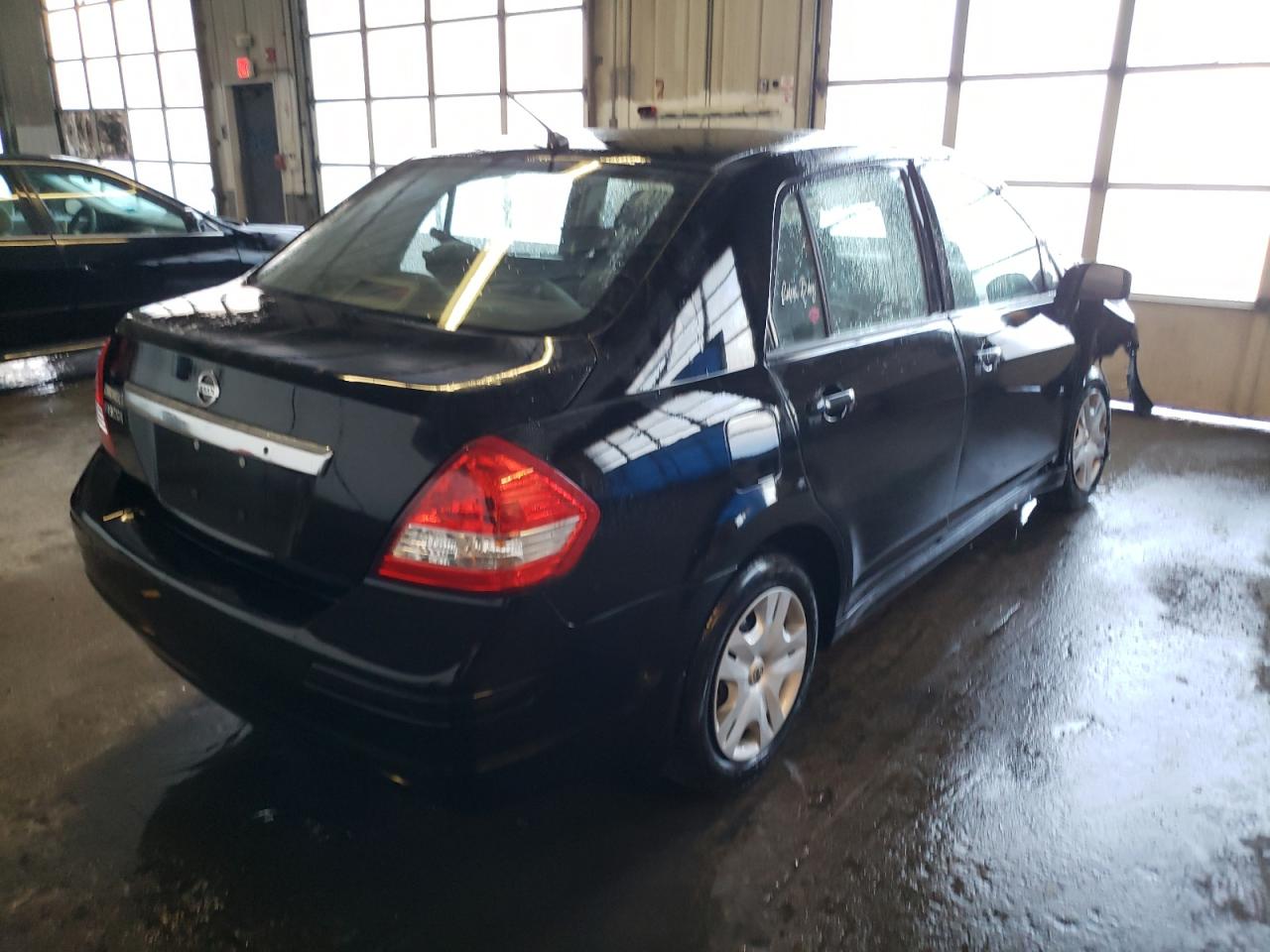 Photo 4 from auction – 2011 NISSAN VERSA S with VIN 3N1BC1AP9BL468478