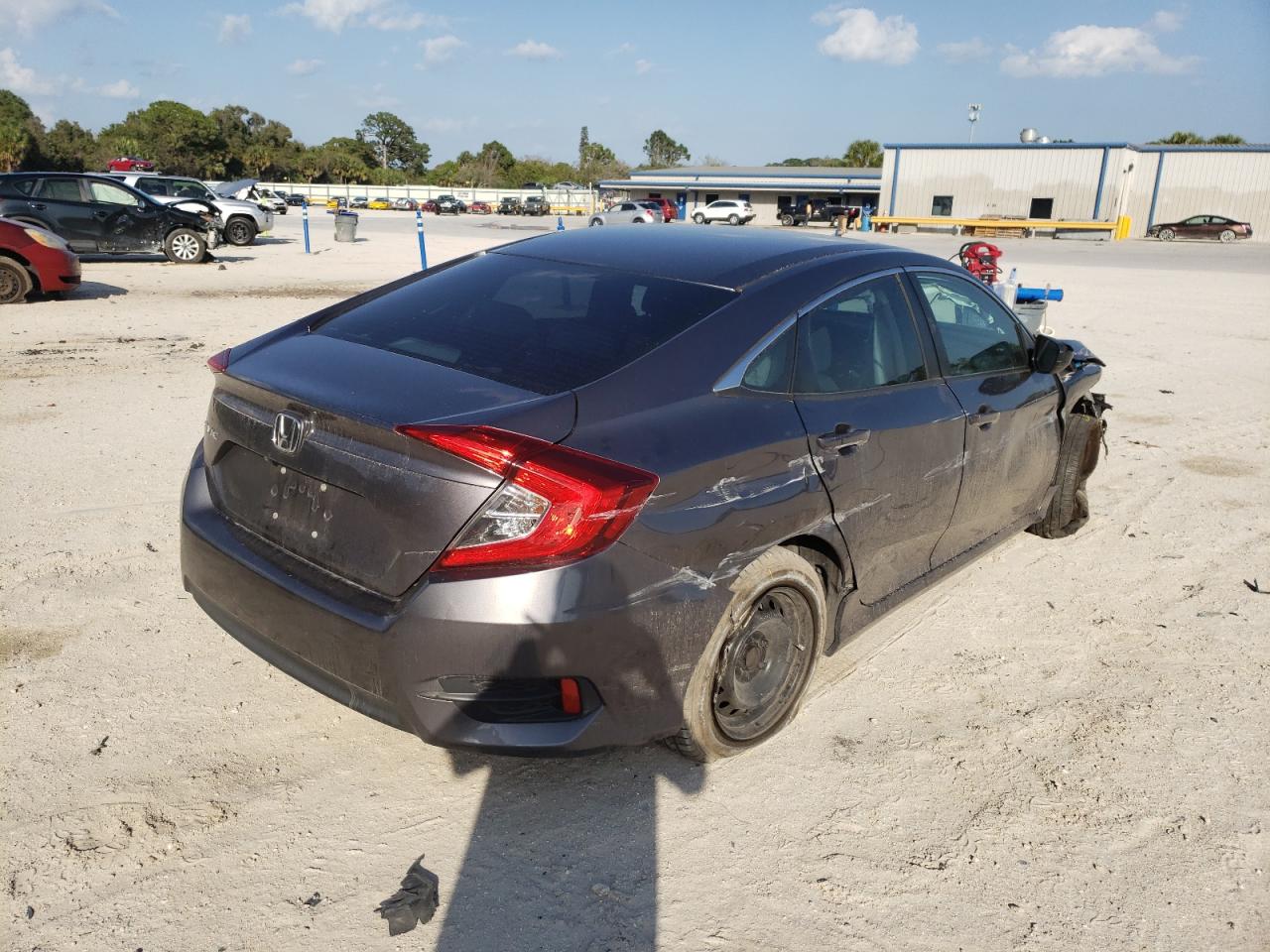 Photo 4 from auction – 2017 HONDA CIVIC LX with VIN 19XFC2F55HE001244