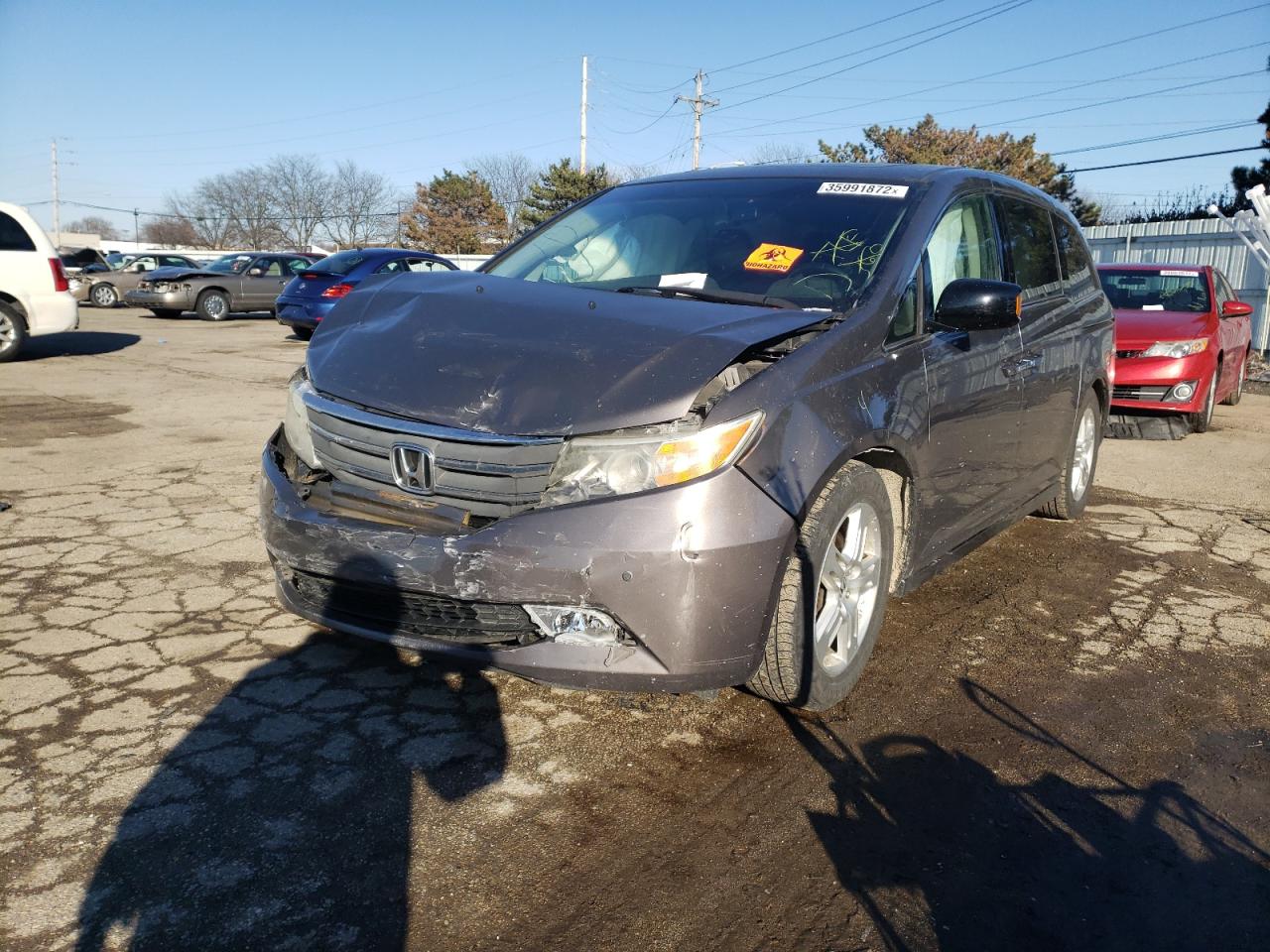 Photo 2 from auction – 2012 HONDA ODYSSEY TO with VIN 5FNRL5H99CB034622