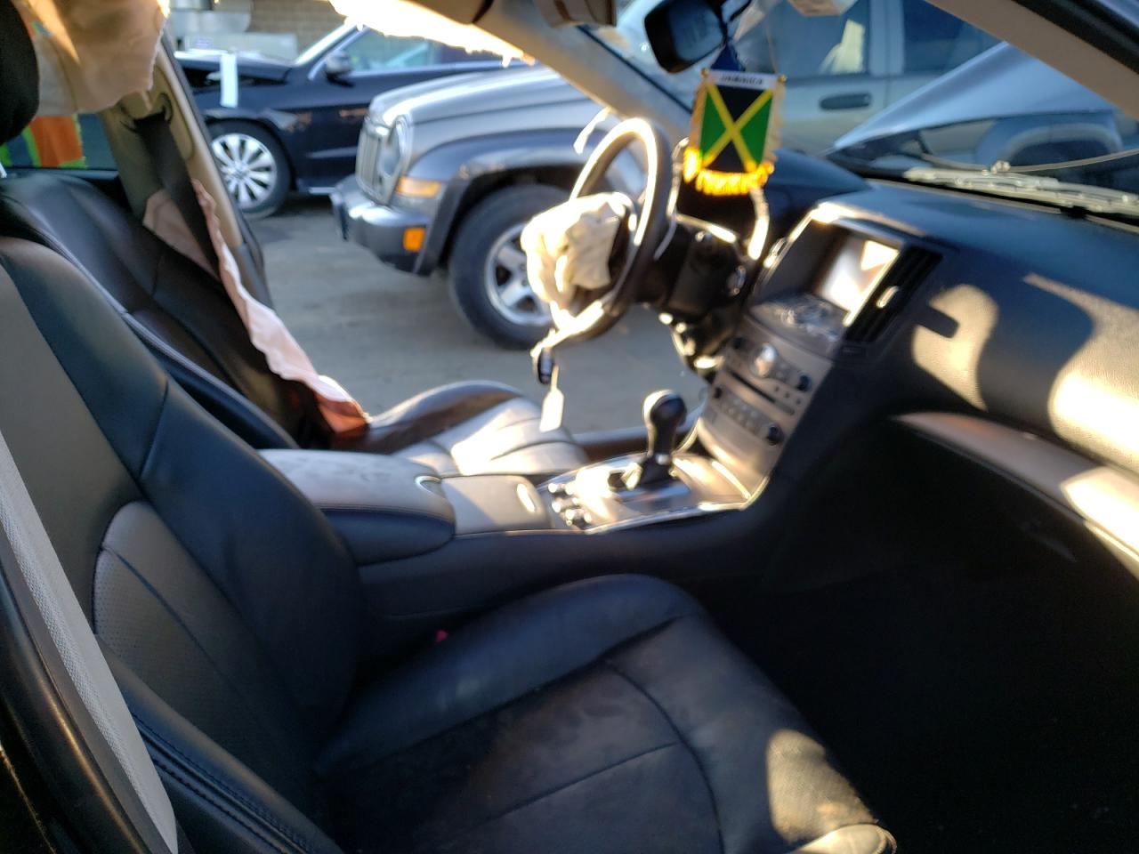 Photo 5 from auction – 2015 INFINITI Q40 with VIN JN1CV6AR0FM520962