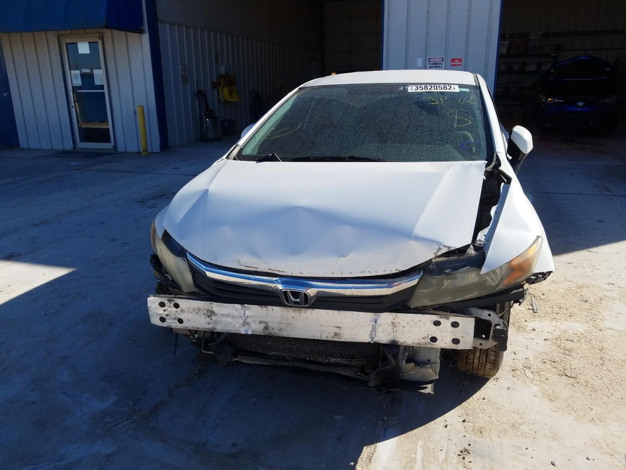 Photo 9 from auction – 2012 HONDA CIVIC LX with VIN 2HGFB2F53CH305822