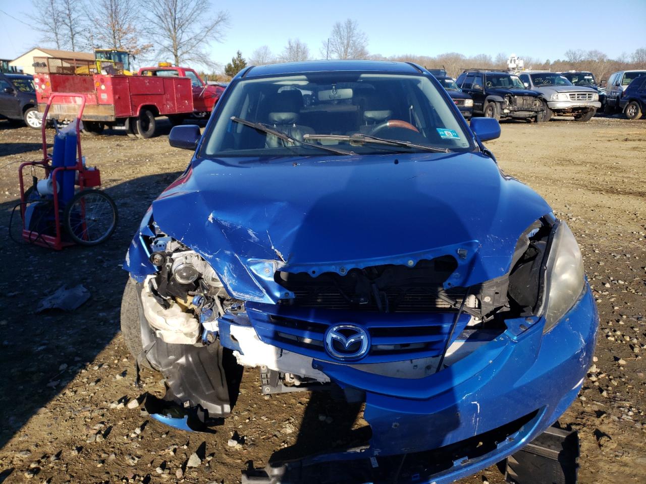 Photo 9 from auction – 2005 MAZDA 3 HATCHBAC with VIN JM1BK143951245796