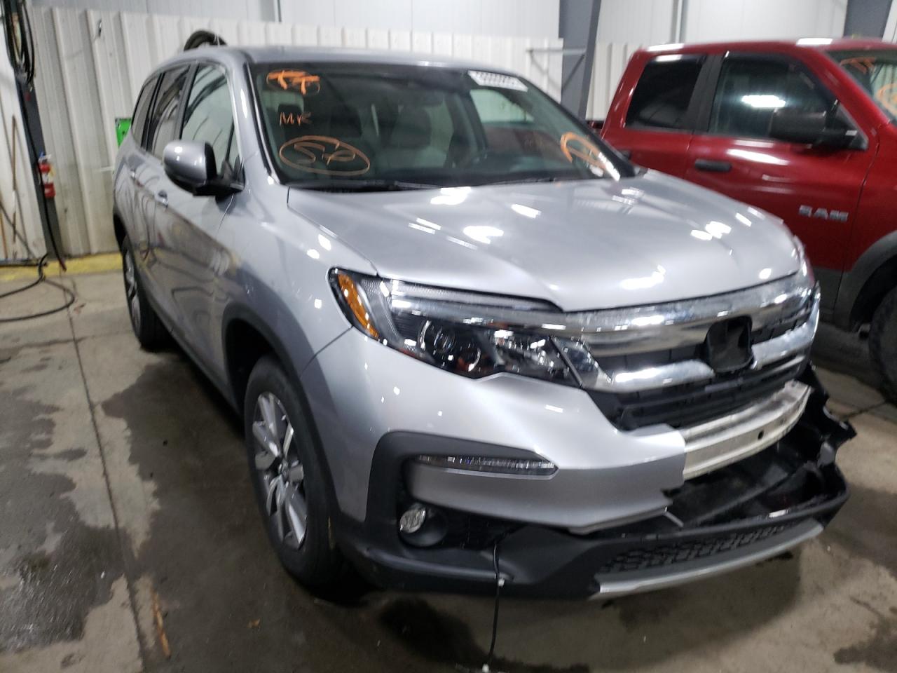 HONDA PILOT EXL 2022 with VIN 5FNYF6H53NB022863 - Photo from auction
