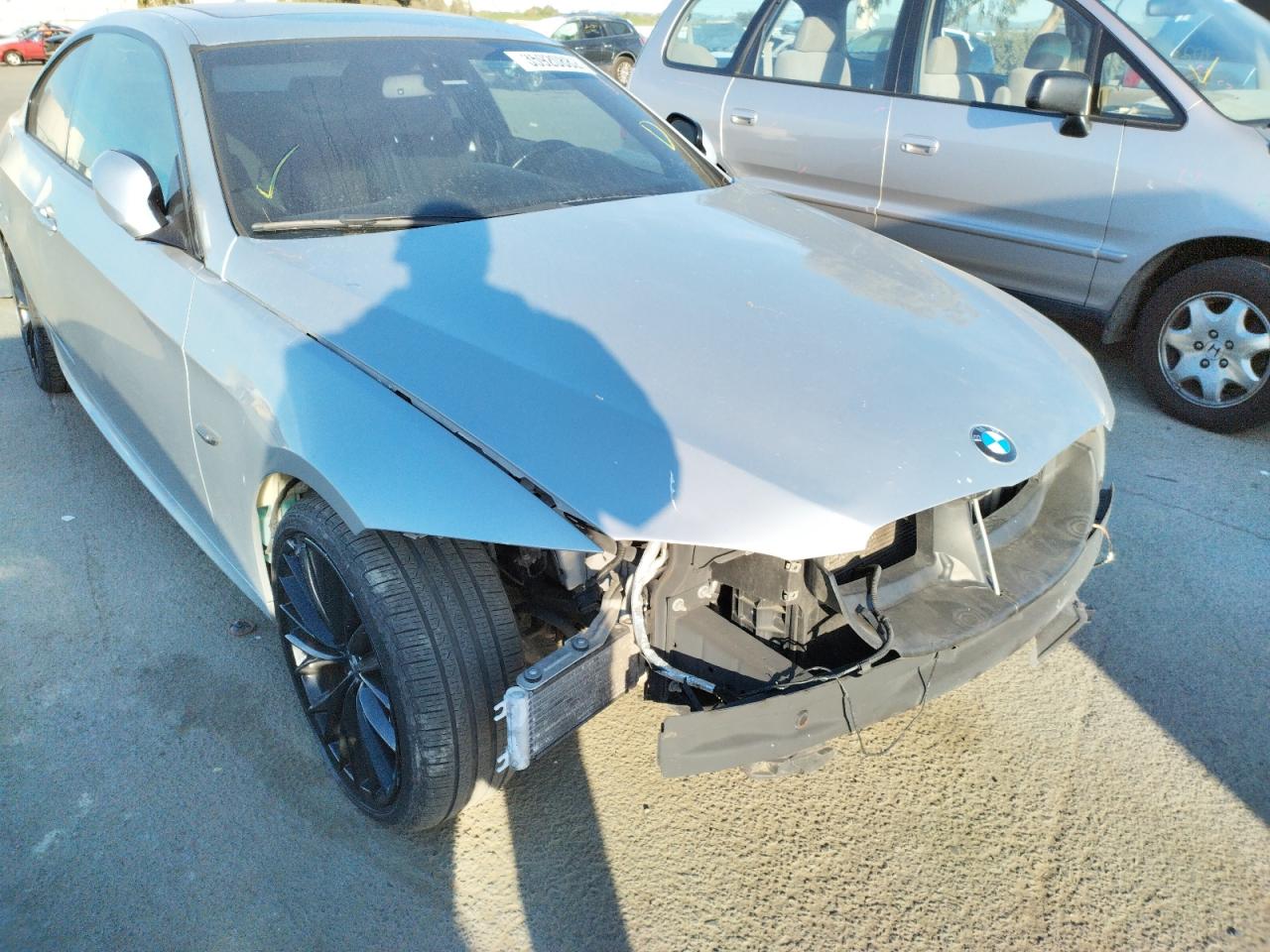 Photo 9 from auction – 2011 BMW 335 I with VIN WBAKG7C57BE264338