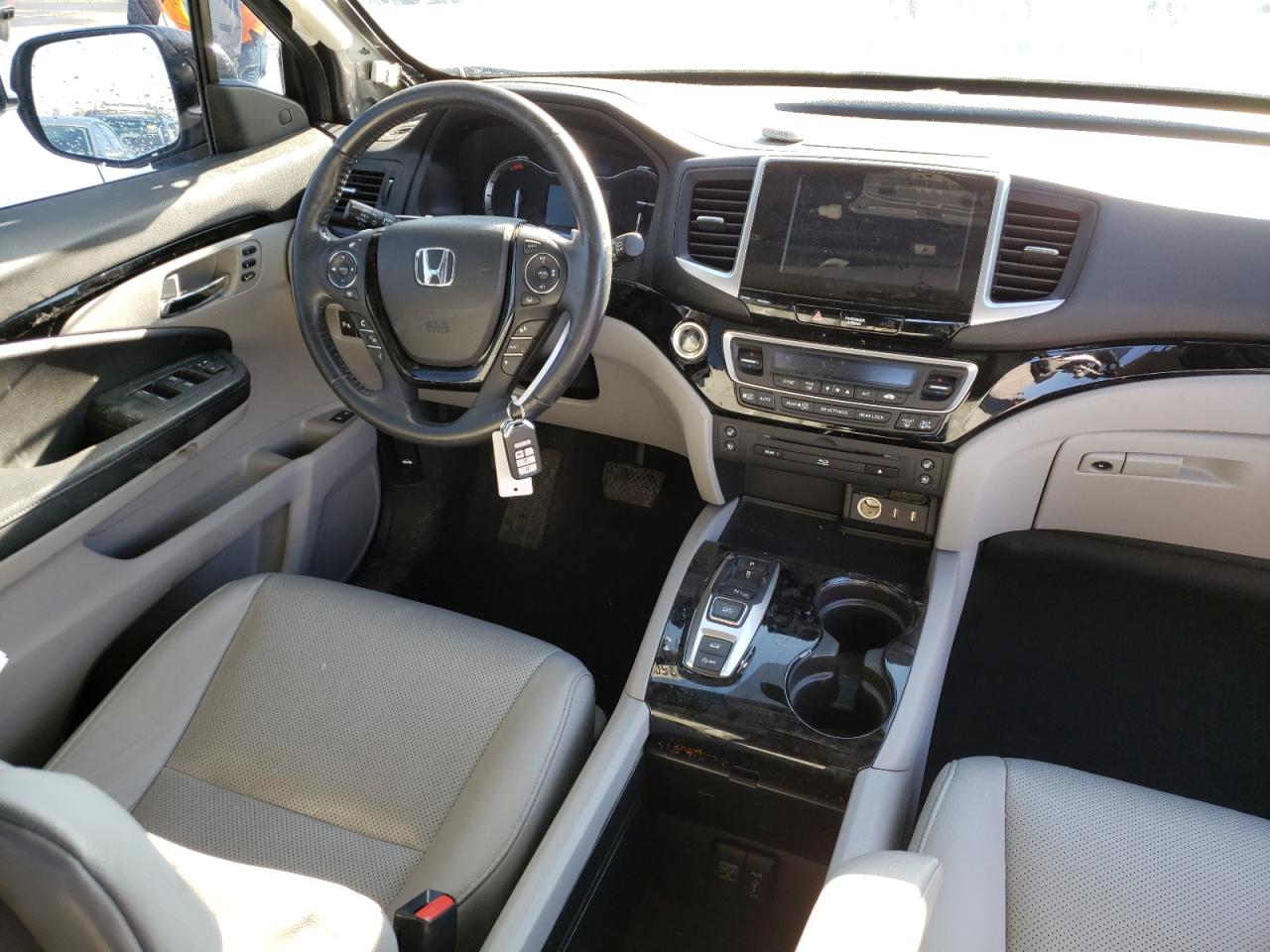Photo 9 from auction – 2017 HONDA PILOT ELIT with VIN 5FNYF6H00HB068434