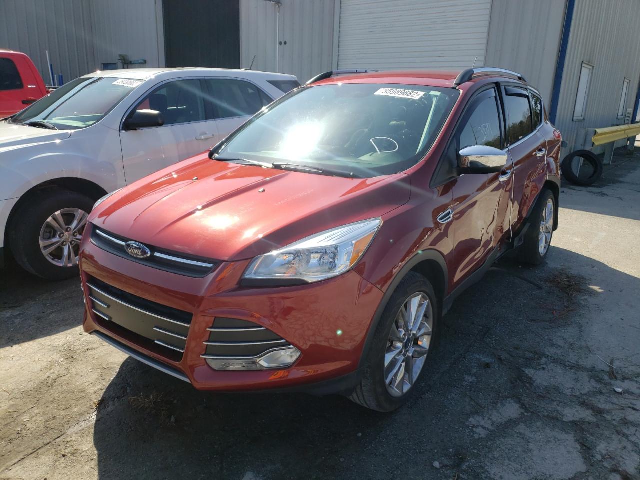 Photo 2 from auction – 2016 FORD ESCAPE SE with VIN 1FMCU0G95GUC73083