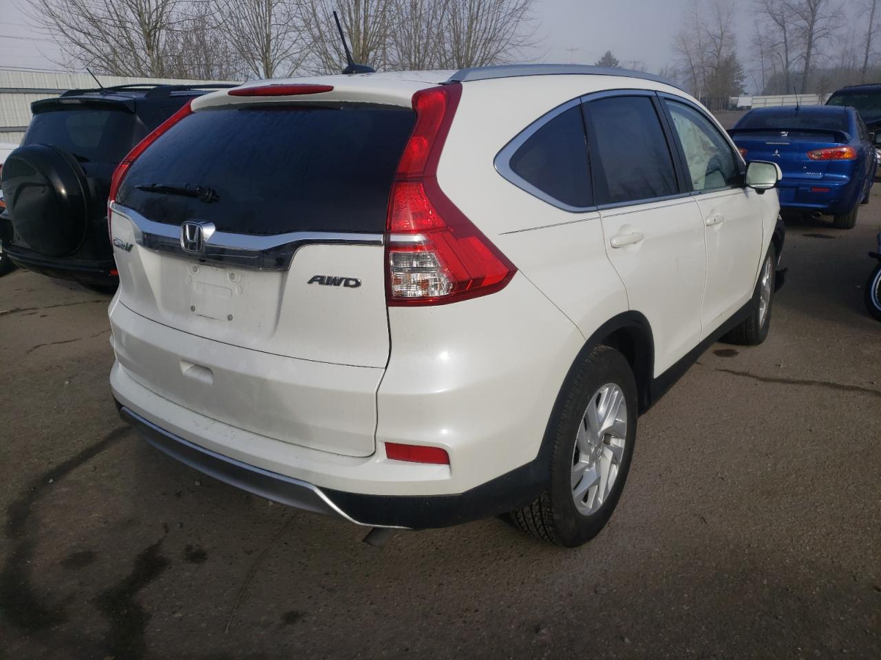 Photo 4 from auction – 2016 HONDA CR-V EXL with VIN 5J6RM4H70GL070184