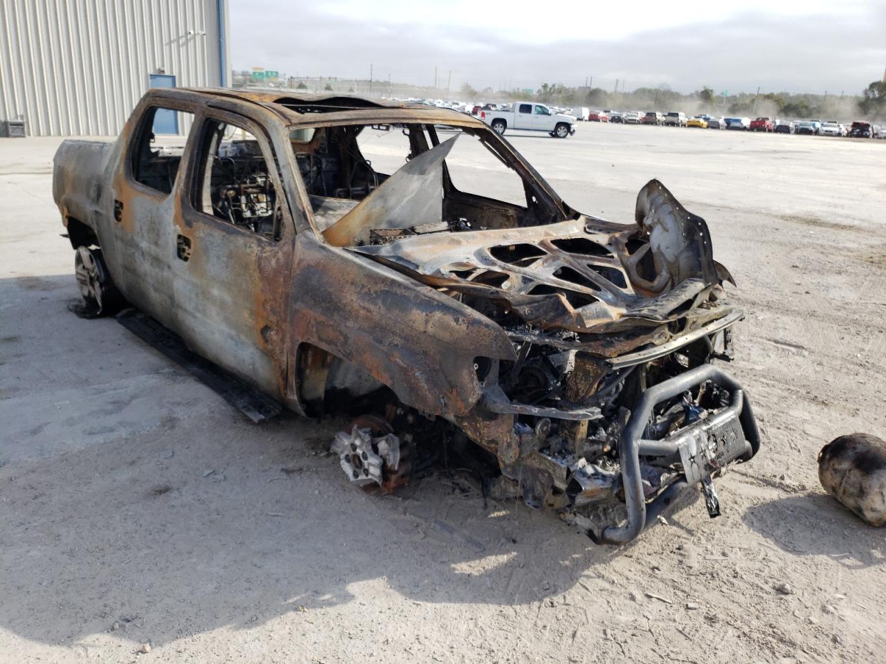 HONDA RIDGELINE 2011 with VIN 5FPYK1F5XBB007989 - Photo from auction
