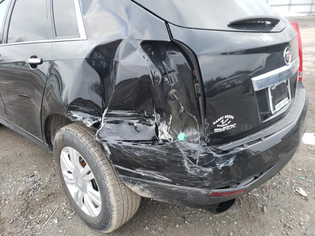 Photo 9 from auction – 2015 CADILLAC SRX with VIN 3GYFNAE31FS609310