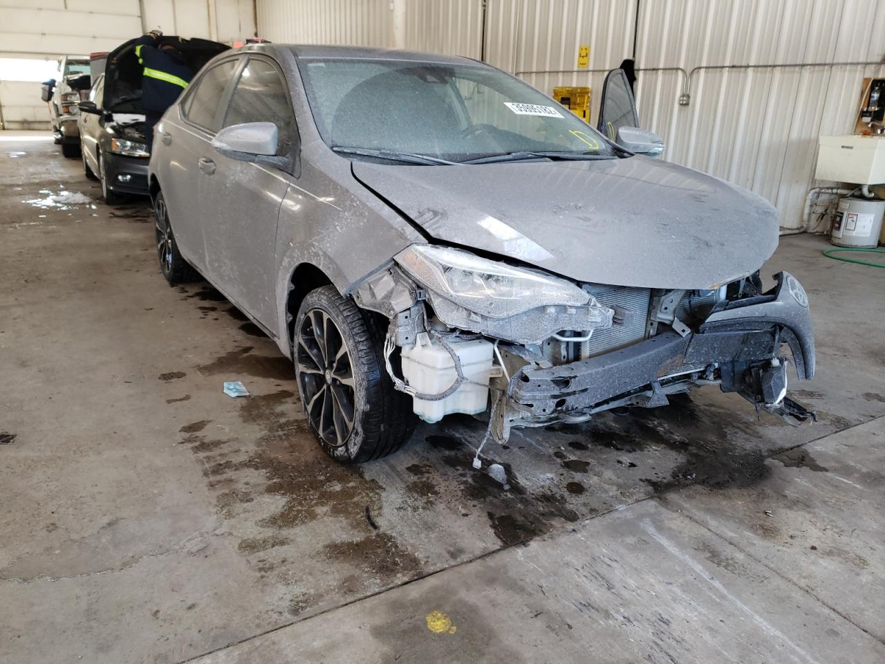 TOYOTA COROLLA L 2017 with VIN 5YFBURHE3HP682018 - Photo from auction
