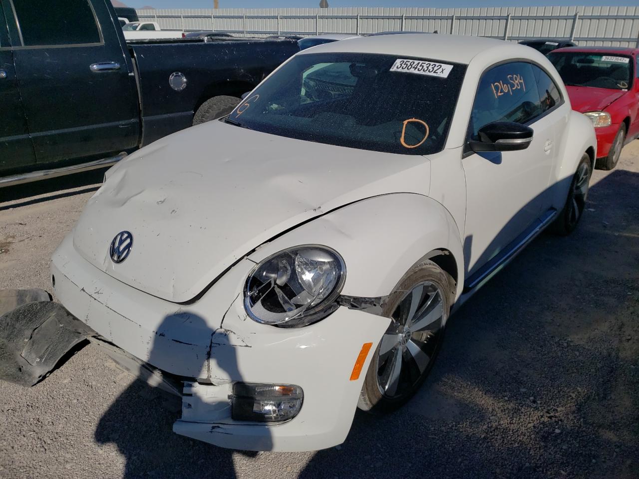 Photo 2 from auction – 2012 VOLKSWAGEN BEETLE TUR with VIN 3VWVA7AT9CM653767