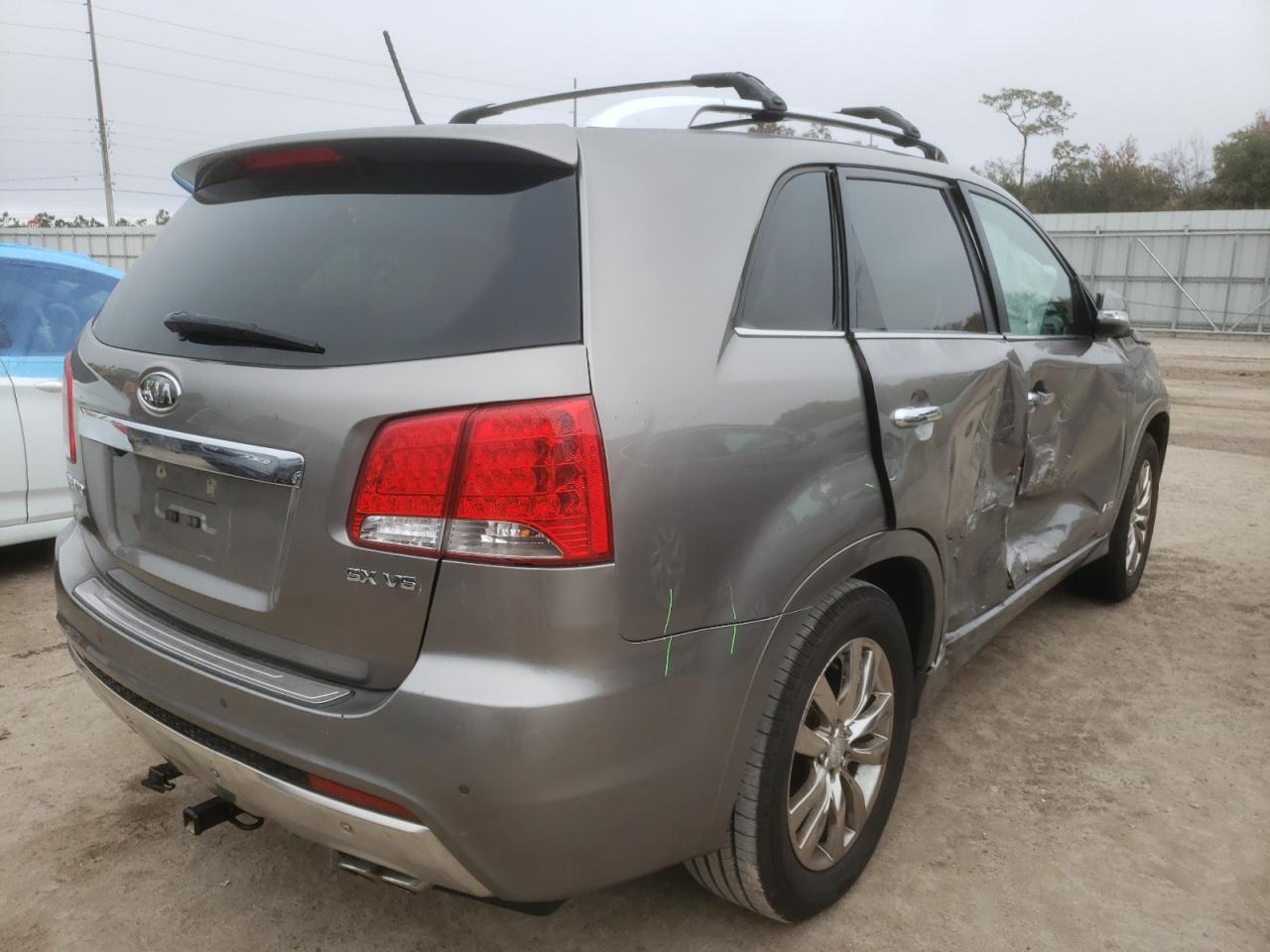 Photo 4 from auction – 2012 KIA SORENTO SX with VIN 5XYKWDA27CG229482