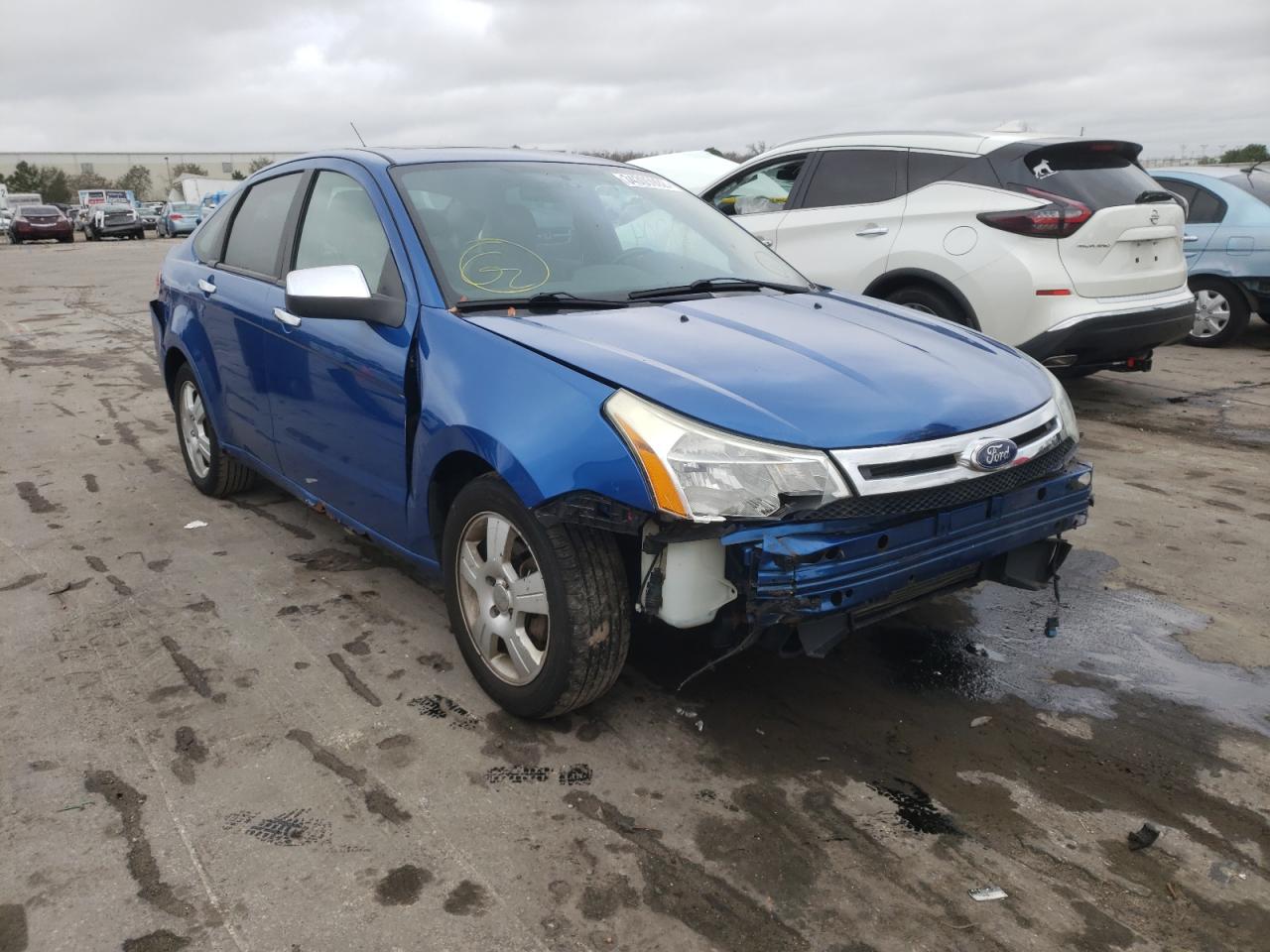 FORD FOCUS SEL 2011 with VIN 1FAHP3HN3BW144258 - Photo from auction