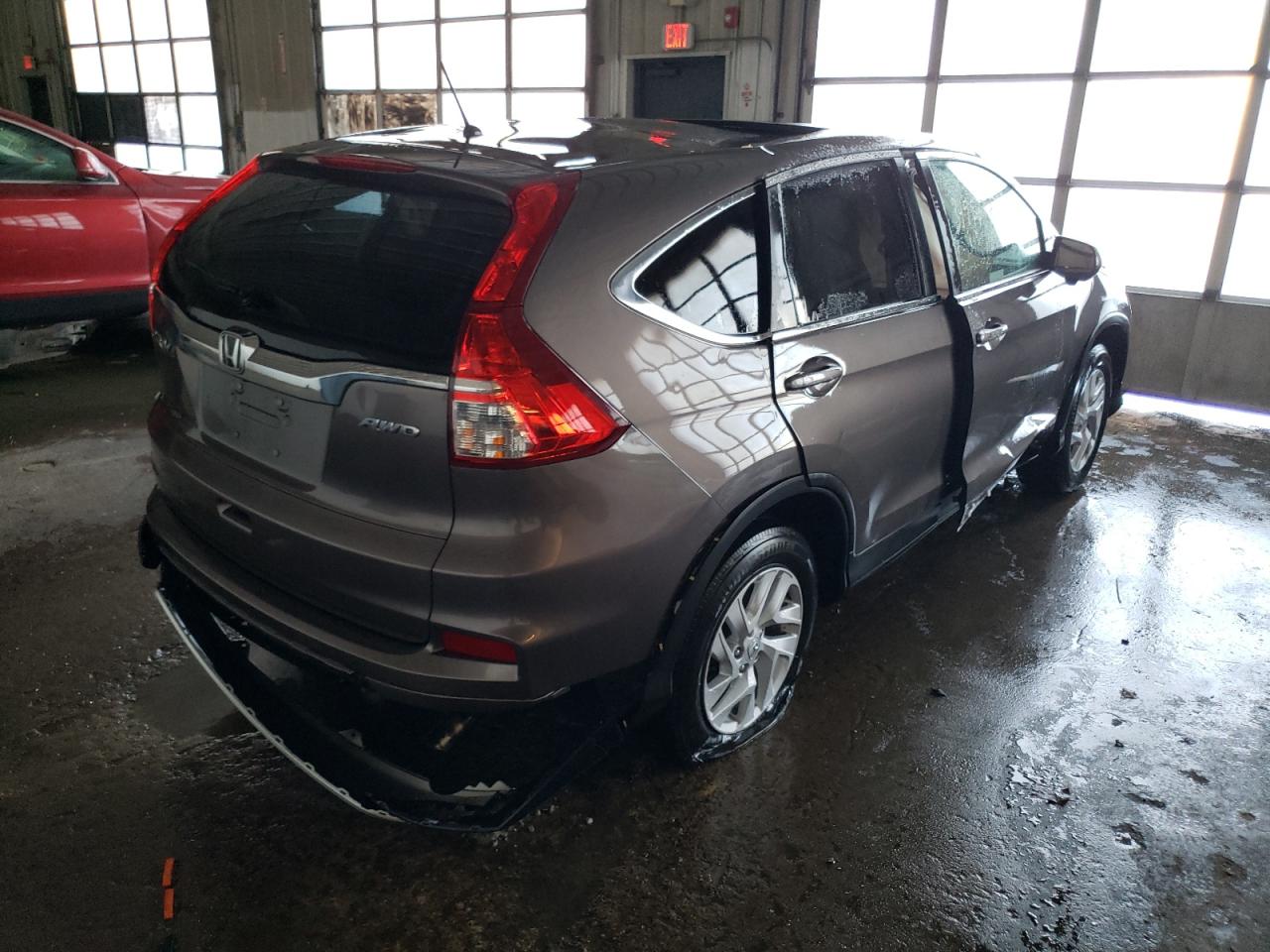 Photo 4 from auction – 2016 HONDA CR-V EX with VIN 2HKRM4H58GH698258