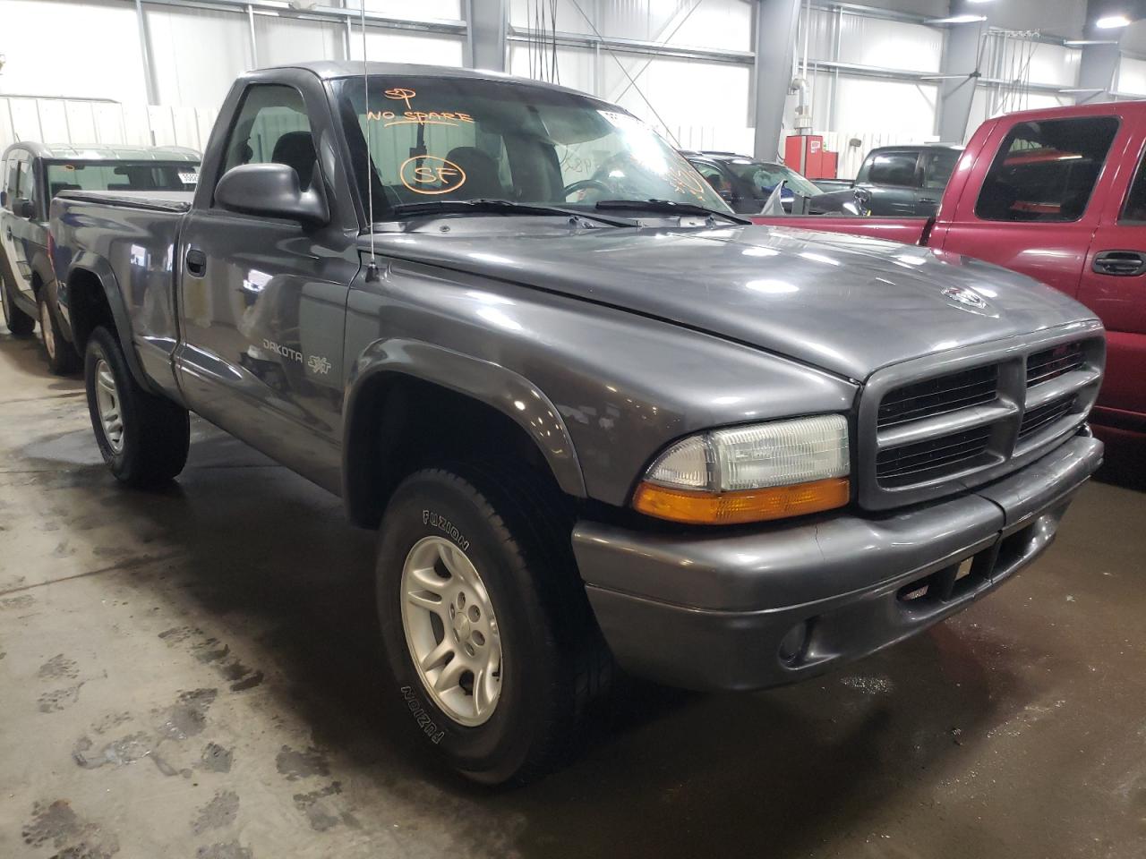 DODGE DAKOTA BAS 2002 with VIN 1B7GG16X92S721574 - Photo from auction