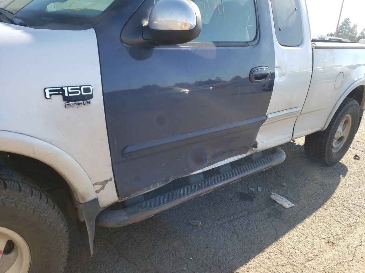 Photo 9 from auction – 2000 FORD F150 with VIN 1FTRX18L6YKA02276