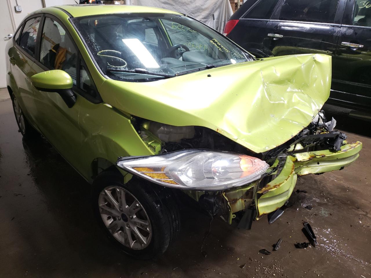 FORD FIESTA SE 2011 with VIN 3FADP4BJ6BM144779 - Photo from auction