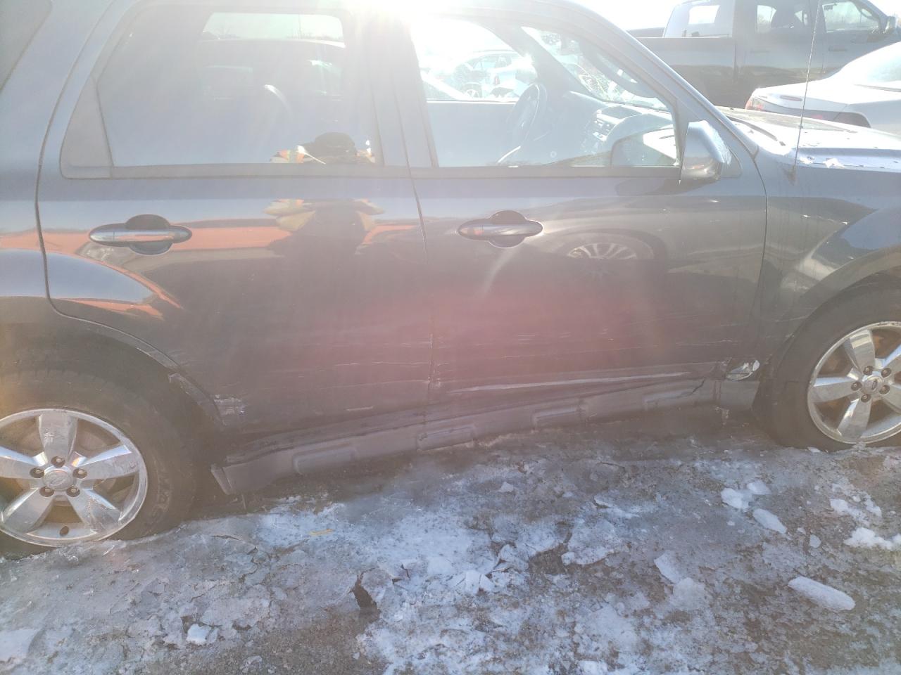 Photo 9 from auction – 2009 FORD ESCAPE LIM with VIN 1FMCU04G19KC34363