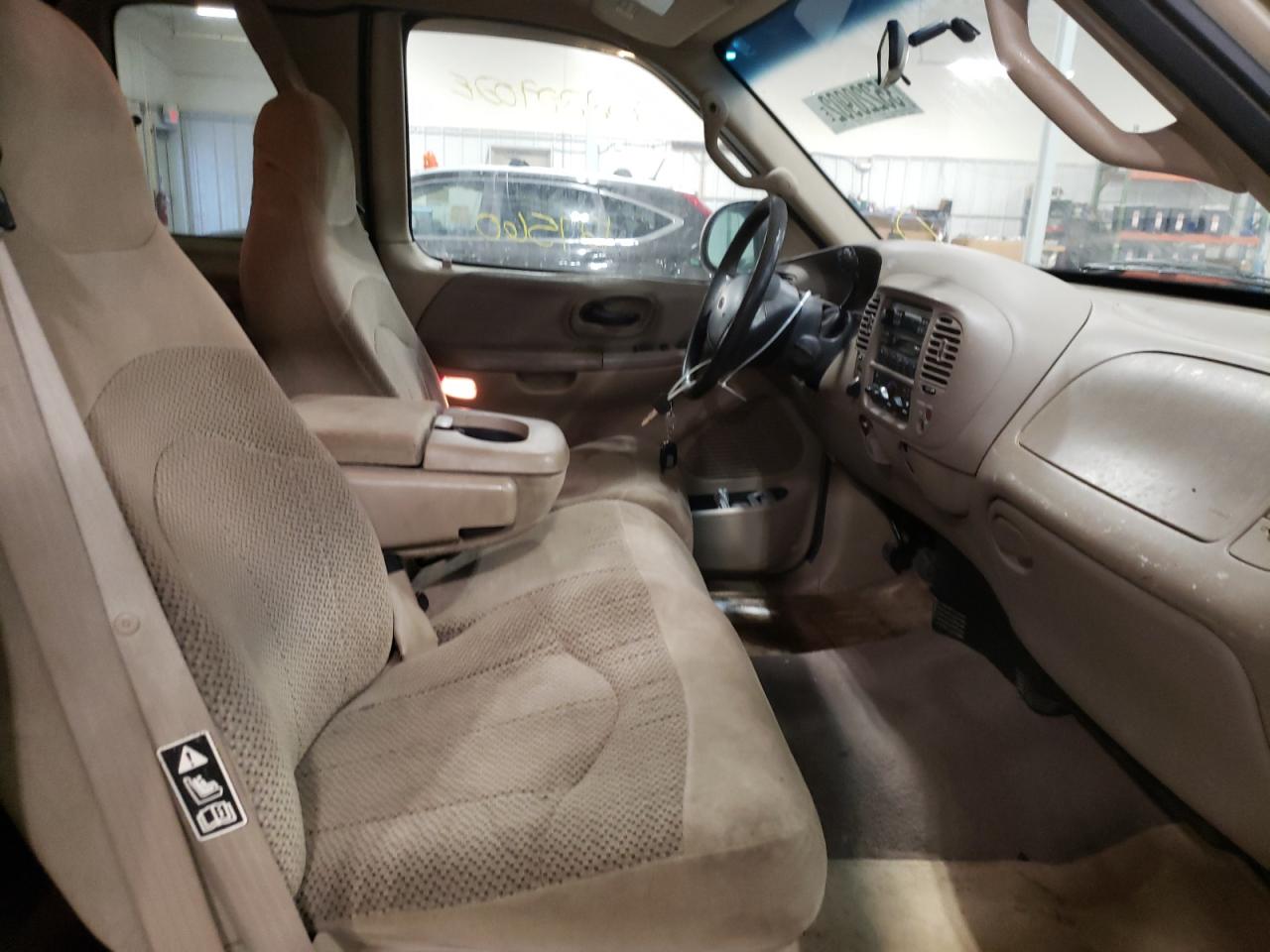Photo 5 from auction – 2000 FORD F-150 with VIN 2FTRX18W7YCA70617
