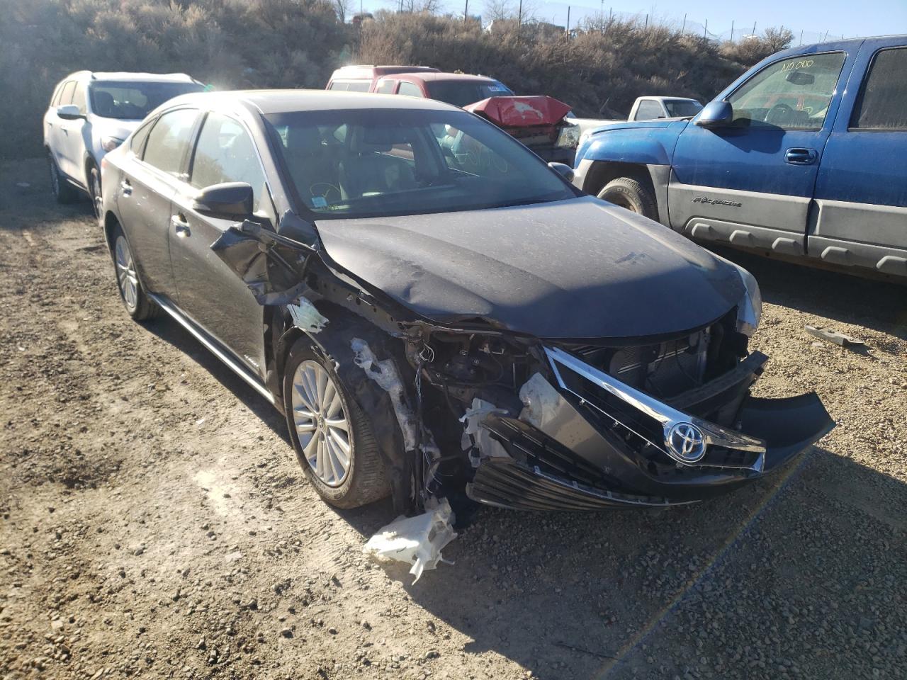 TOYOTA AVALON HYB 2014 with VIN 4T1BD1EB8EU021199 - Photo from auction