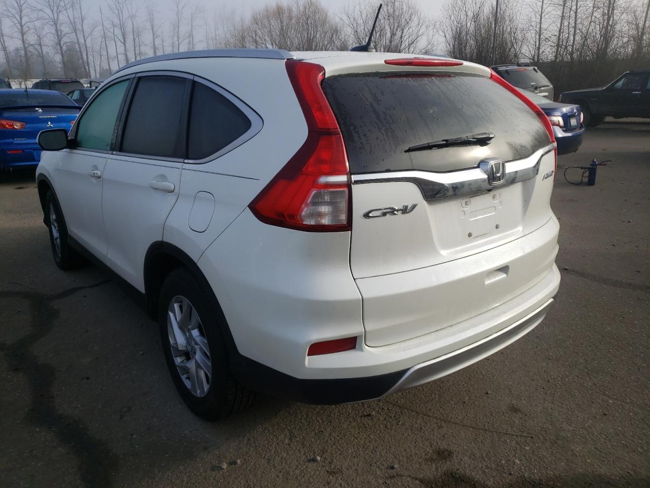 Photo 3 from auction – 2016 HONDA CR-V EXL with VIN 5J6RM4H70GL070184
