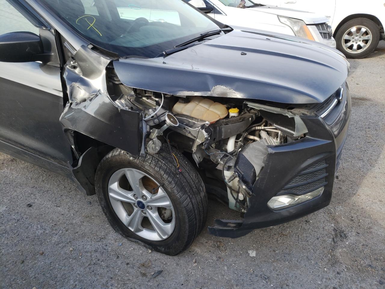 Photo 9 from auction – 2015 FORD ESCAPE SE with VIN 1FMCU0G77FUB36286