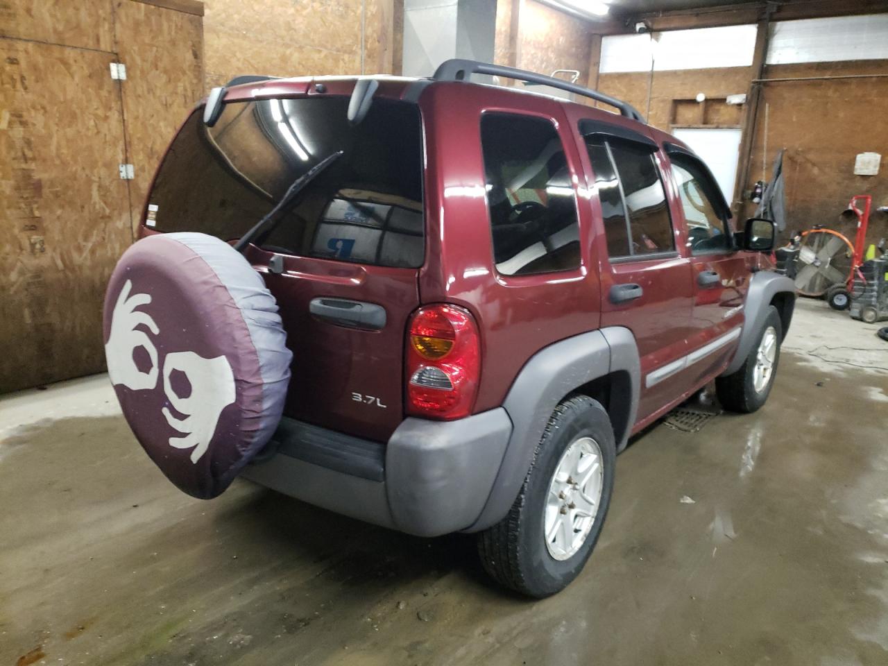 Photo 4 from auction – 2003 JEEP LIBERTY SP with VIN 1J4GL48K03W562981