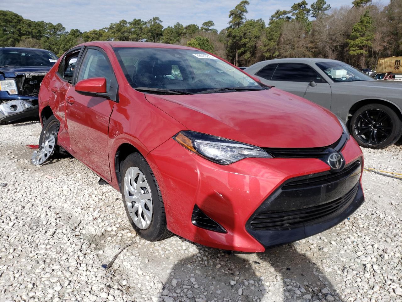 TOYOTA COROLLA L 2017 with VIN 5YFBURHE7HP693569 - Photo from auction