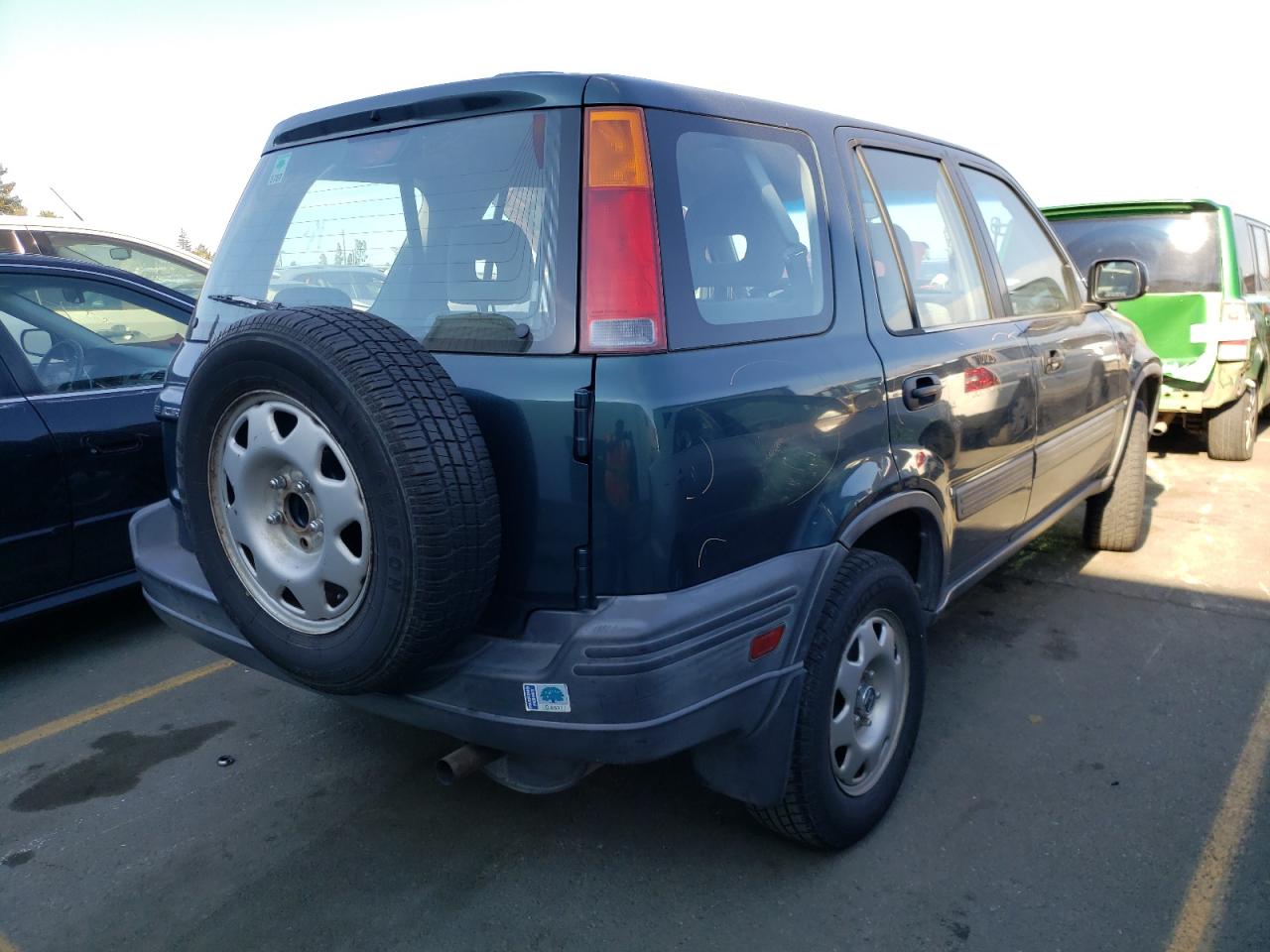 Photo 4 from auction – 1998 HONDA CR-V LX with VIN JHLRD1844WC035675