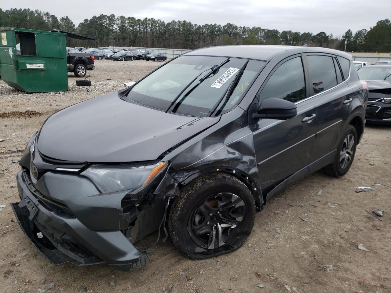 Photo 2 from auction – 2018 TOYOTA RAV4 LE with VIN JTMZFREV6JJ174133