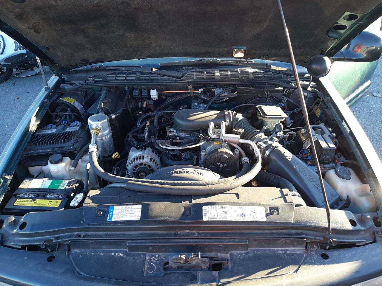 Photo 7 from auction – 1997 GMC SONOMA with VIN 1GTCS19X9V8528125