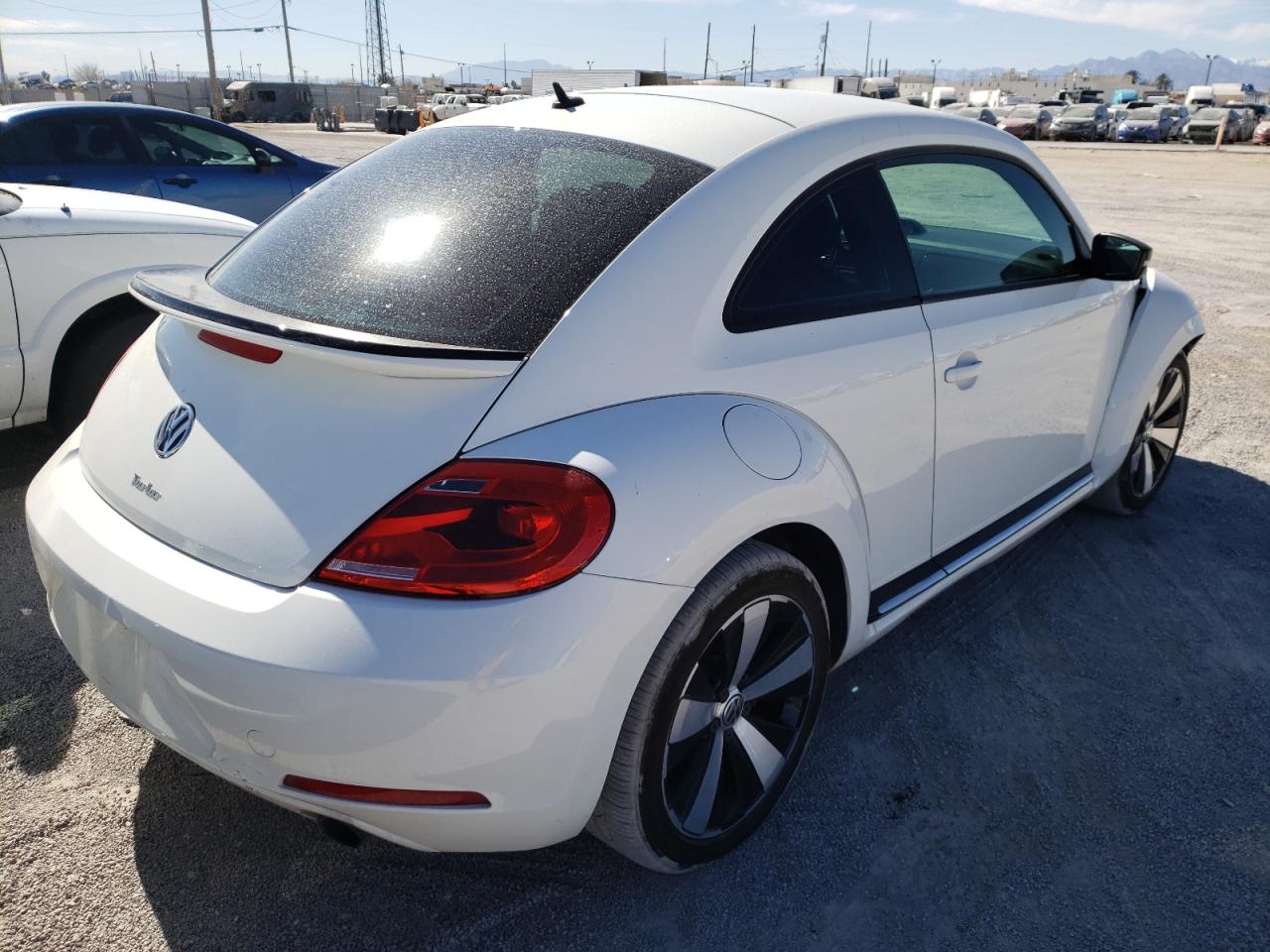 Photo 4 from auction – 2012 VOLKSWAGEN BEETLE TUR with VIN 3VWVA7AT9CM653767