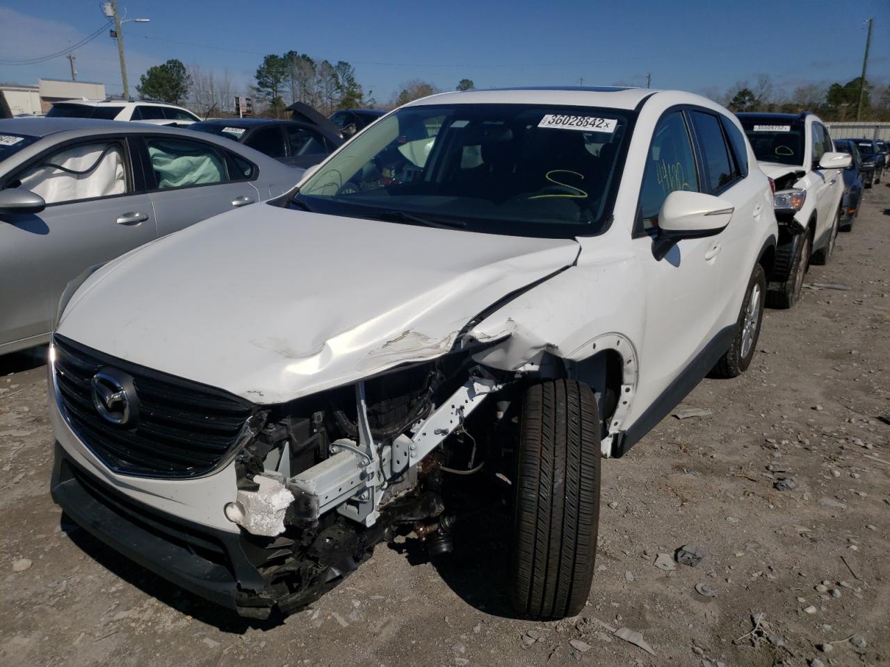 Photo 2 from auction – 2016 MAZDA CX-5 TOURI with VIN JM3KE4CY0G0689669
