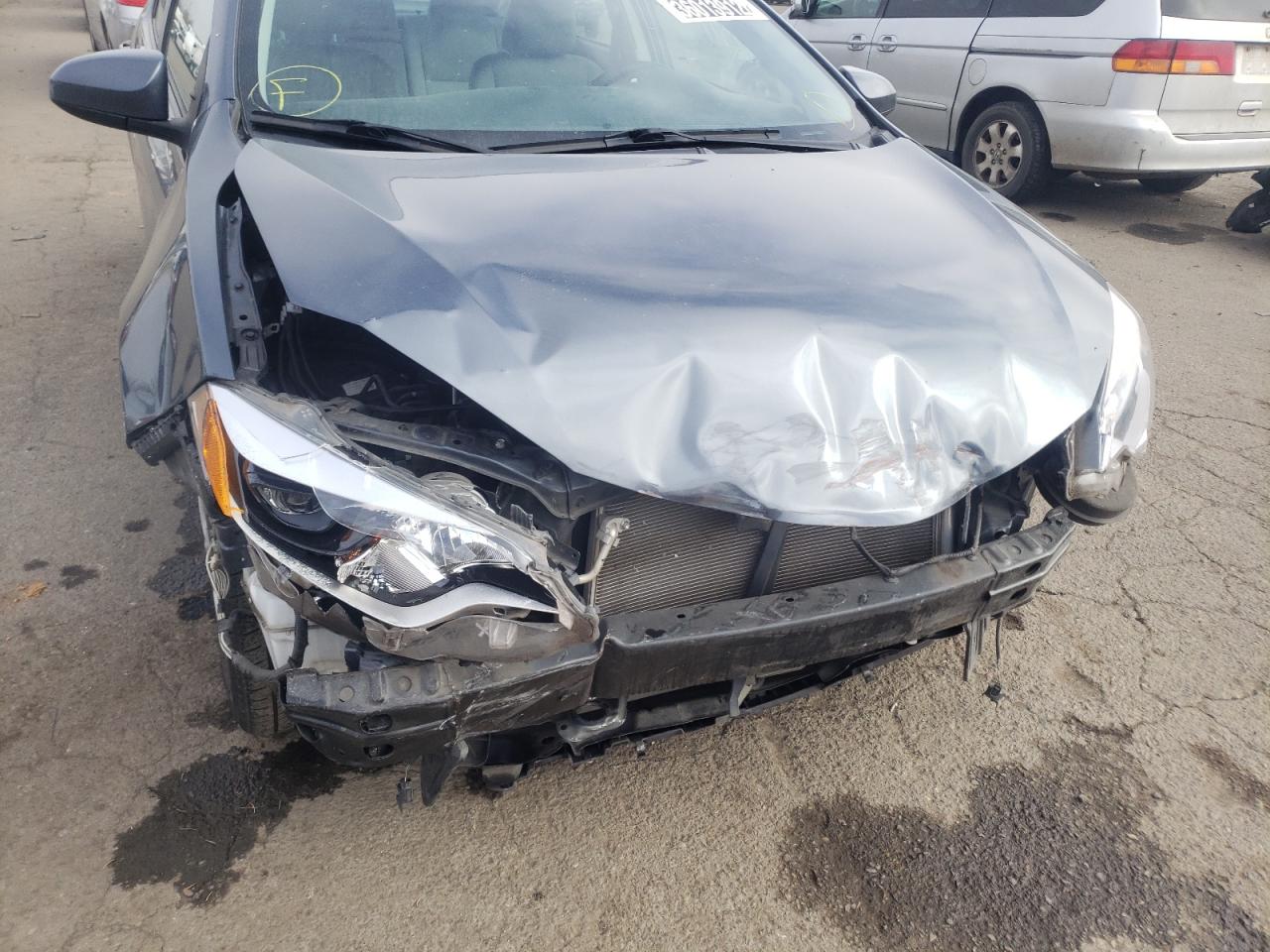 Photo 9 from auction – 2015 TOYOTA COROLLA EC with VIN 2T1BPRHE6FC419252