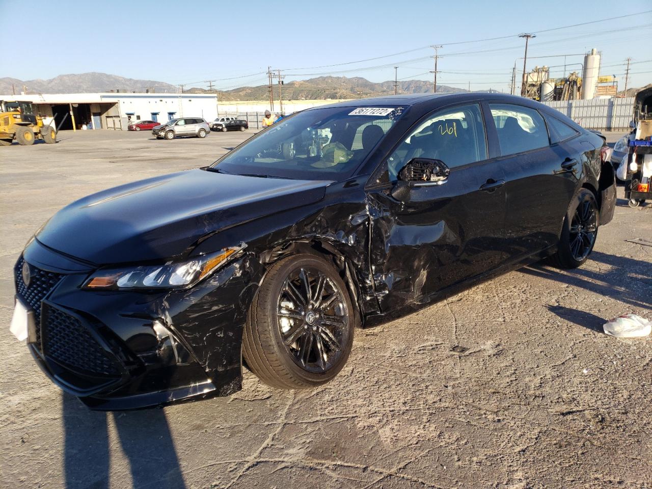 Photo 2 from auction – 2022 TOYOTA AVALON NIG with VIN 4T1EA1AB9NU012877