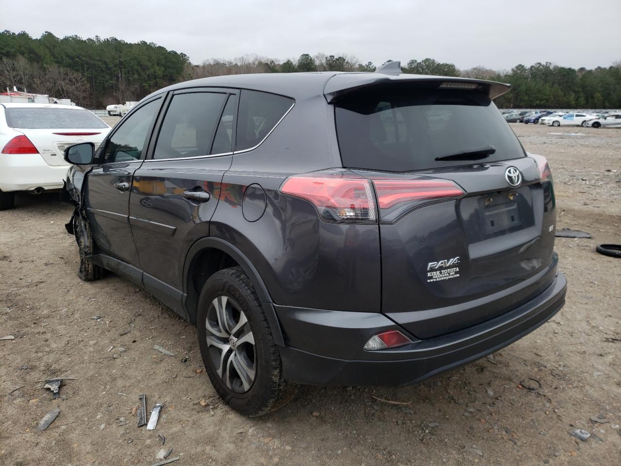 Photo 3 from auction – 2018 TOYOTA RAV4 LE with VIN JTMZFREV6JJ174133